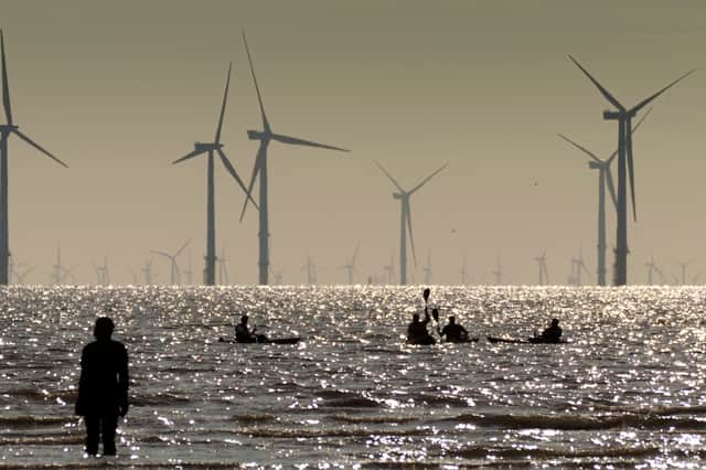 <p>The Burbo Bank Offshore Wind Farm in the Mersey Estuary. Photo: Christopher Furlong/Getty Images</p>