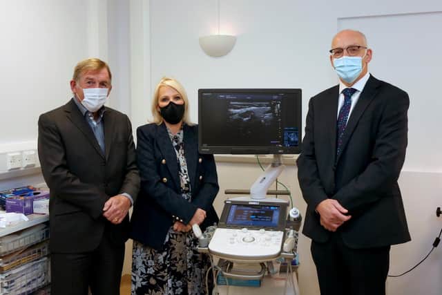 Sir Kenny and Marina Dalglish with Prof Jones with the ultrasound machine. Image: LUHFT