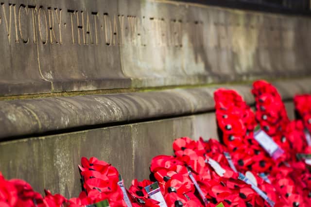 <p>Poppy wreaths at the Liverpool Cenotaph. Image: Shutterstock</p>