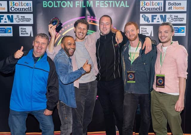 Sam with Paul Chambers and the cast and crew of Three Bull-Mastiffs and a Corner Kitchen. Image: Sam Batley 