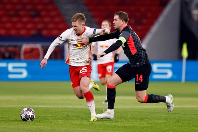 Dani Olmo in action for RB Leipzig against Liverpool’s Jordan Henderson. Picture: Laszlo Szirtesi/Getty Images