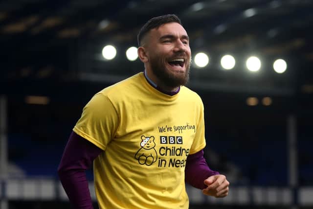 Ex-West Ham winger Robert Snodgrass warms up before a game against Everton in 2019.