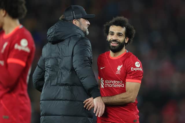Mo Salah celebrates Liverpool’s victory over Arsenal with Jurgen Klopp. Picture: Clive Brunskill/Getty Images