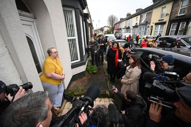Liverpool Mayor Joanne Anderson, Merseyside Police and Crime Commissioner Emily Spurrell and Merseyside Police Chief Constable Serena Kennedy speak to a resident in Sutcliffe Street in Liverpool. Photo: OLI SCARFF/AFP via Getty Images