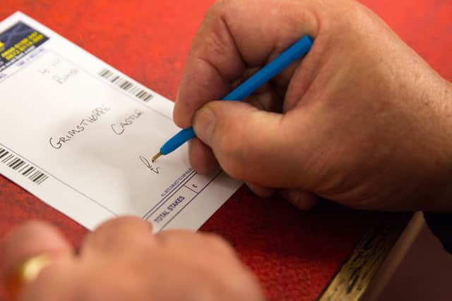 Seventeen of Knowsley’s 34 betting shops are in Huyton. Photo: Robert Perry/Getty Images