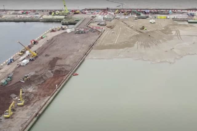 The infill of Bramley-Moore Dock with fluidised sand dredged from Liverpool Bay begins. Credit: Everton FC