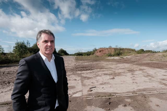 <p>Metro Mayor Steve Rotheram at the Moss Nook brownfield site in St Helens.</p>