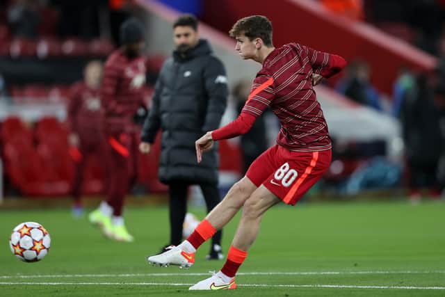 Tyler Morton warms up ahead of Liverpool’s clash with Porto. Picture: Clive Brunskill/Getty Images