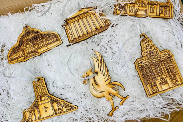 Wooden laser cut decorations of Liverpool landmarks. Image: Florence and Fox