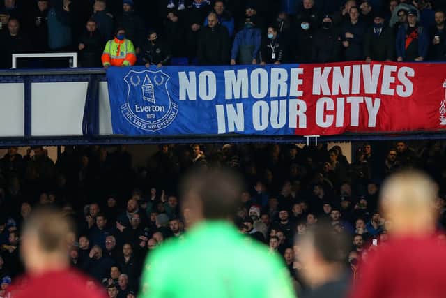 A banner saying ‘No more knives in our city’ is displayed in the stand prior to the Premier League match between Everton and Liverpool. Photo: Alex Livesey/Getty Images