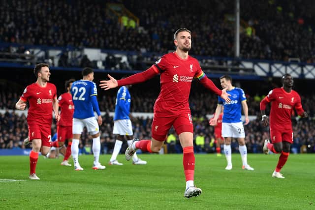 Jordan Henderson celebrates opening the scoring for Liverpool against Everton. Picture: Laurence Griffiths/Getty Images