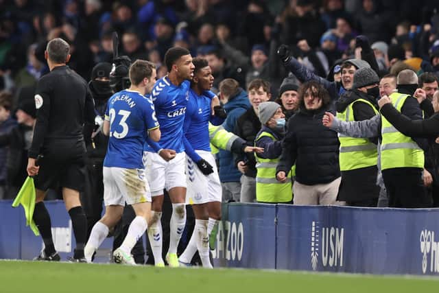 Demarai Gray (R) of Everton celebrates with Mason Holgate and teammates after scoring their side’s second goal. Photo: Naomi Baker/Getty Images