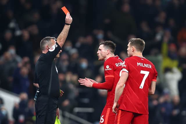 Andy Robertson is in disbelief after being sent off in Liverpool’s draw at Totenham. Picture: Julian Finney/Getty Images
