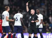 Harry Kane was given a yellow card for his lunge on Andy Robertson. Picture: Alex Pantling/Getty Images