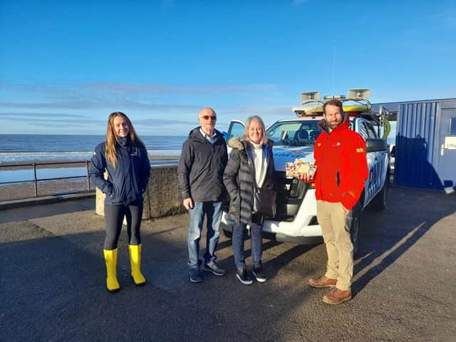 <p>Lynne and husband George meeting Siobhan Murphy and Andy Jordan, RNLI lifeguard supervisors. </p>