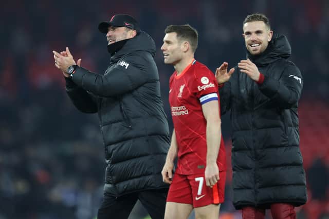Jurgen Klopp celebrates with Jordan Henderson and James Milner after the Carabao Cup Quarter Final match between Liverpool and Leicester City at Anfield. Picture: Naomi Baker/Getty Images