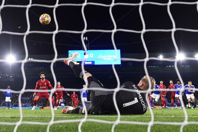 Mohamed Salah of Liverpool has his penalty saved by Kasper Schmeichel of Leicester City during the Premier League match between Leicester City  and  Liverpool at The King Power Stadium on December 28, 2021 in Leicester, England. (Photo by Laurence Griffiths/Getty Images)