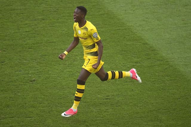 Ousmane Dembele celebrates scoring for Borussia Dortmund. Picture: ODD ANDERSEN/AFP via Getty Images
