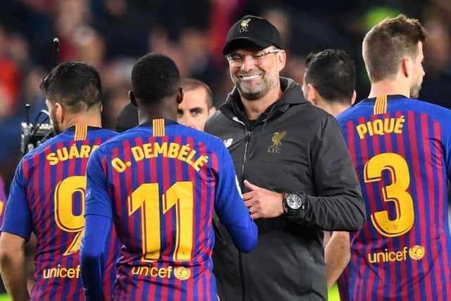 Liverpool boss Jurgen Klopp with Barcelona forward Ousmane Dembele. Picture: Michael Regan/Getty Images
