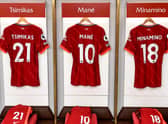 Liverpool shirts hanging in the Anfield dressing room. Picture:  Andrew Powell/Liverpool FC via Getty Images