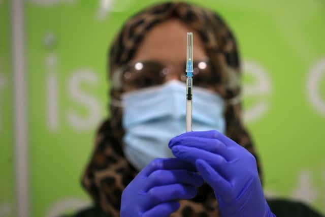 Are you eligible for a free vaccine for the flu? (Photo: LINDSEY PARNABY/AFP via Getty Images)