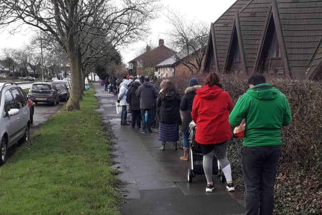 Queue of people waiting to make use of the saved food form the South Liverpool Zero Waste Community. Image: Facebook South Liverpool Zero Waste Community 