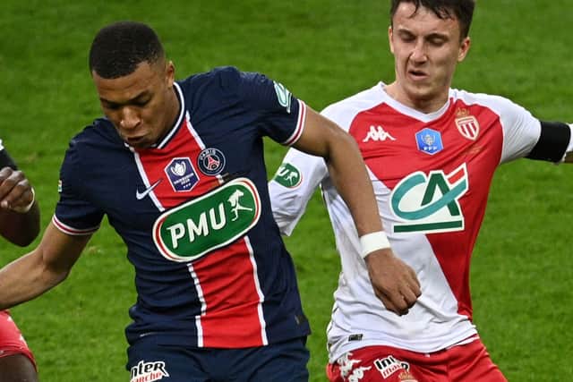Monaco’s Alexander Golovin battles PSG star Kylian Mbappe during last season’s French Cup final. Picture: NNE-CHRISTINE POUJOULAT/AFP via Getty Images
