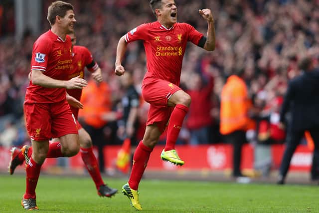 Coutinho and his new boss Gerrard playing together in 2014