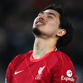 Takumi Minamino of Liverpool reacts during the Carabao Cup Semi Final First Leg match between Liverpool and Arsenal at Anfield on January 13, 2022 in Liverpool, England. (Photo by Michael Regan/Getty Images