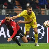 Nathaniel Phillips of Liverpool with Z Ibrahimovic  of Milan  during the UEFA Champions League group B match between AC Milan and Liverpool FC at Giuseppe Meazza Stadium on December 07, 2021 