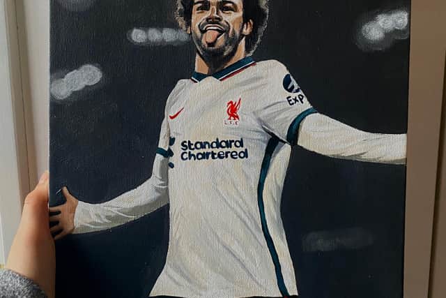 Abigail captured the iconic moment Mo Salah sealed his hat trick in the 5-1 demolition of Manchester United at Old Trafford last year, a momentous occasion for Liverpool fans.  
