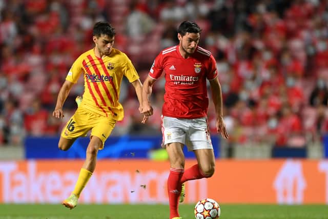 Roman Yaremchuk of Benfica with Pedri of FC Barcelona during the UEFA Champions League group E match between SL Benfica and FC Barcelona at Estadio da Luz. Picture: David Ramos/Getty Images
