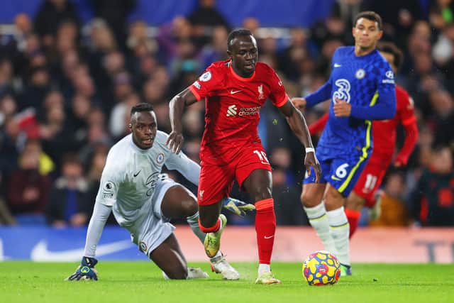 Sadio Mane of Liverpool gets past Edouard Mendy of Chelsea during the Premier League match (Photo by Catherine Ivill/Getty Images)