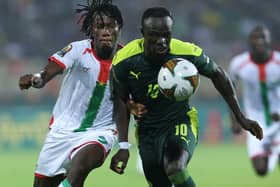 Burkina Faso’s defender Issa Kabore challenges Senegal’s forward Sadio Mane during the Africa Cup of Nations.