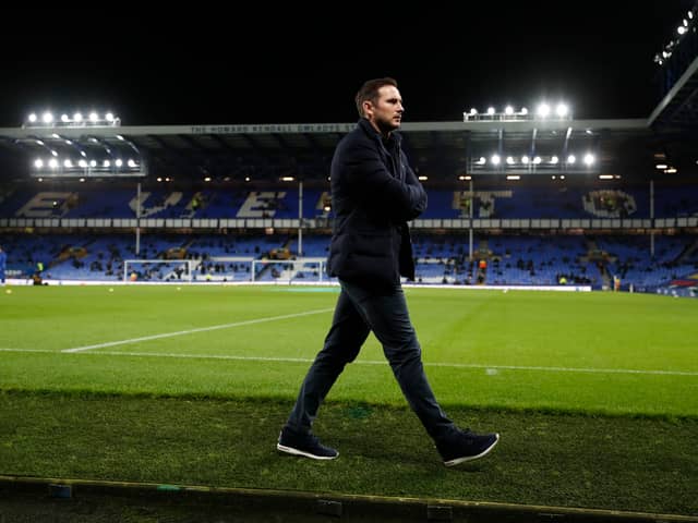 Frank Lampard, Manager of Chelsea looks on as players inspect the pitch prior to the Premier League match between Everton and Chelsea at Goodison Park on December 12, 2020 in Liverpool, England. A limited number of spectators (2000) are welcomed back to stadiums to watch elite football across England. This was following easing of restrictions on spectators in tiers one and two areas only
