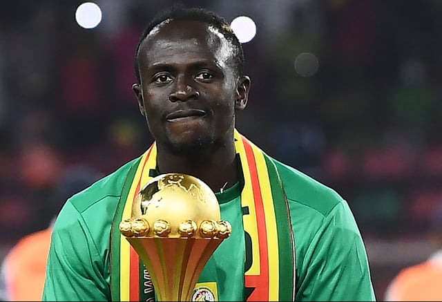 Senegal’s Sadio Mane with the AFCON trophy. Photo: CHARLY TRIBALLEAU/AFP via Getty Images