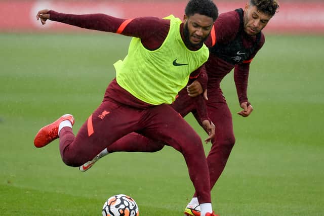 Joe Gomez and Alex Oxlade-Chamberlain during Liverpool training. Picture: Andrew Powell/Liverpool FC via Getty Images)