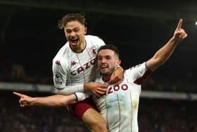 John McGinn of Aston Villa celebrates with teammate Matty Cash after scoring their side’s second goal  during the Premier League match between Crystal Palace and Aston Villa at Selhurst Park on November 27, 2021
