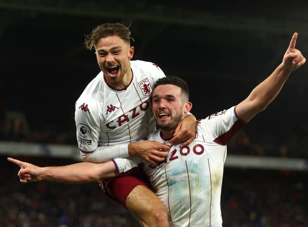 <p>John McGinn of Aston Villa celebrates with teammate Matty Cash after scoring their side’s second goal  during the Premier League match between Crystal Palace and Aston Villa at Selhurst Park on November 27, 2021</p>