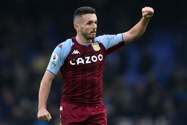 ohn McGinn of Aston Villa gestures towards the fans after their sides victory during the Premier League match between Everton and Aston Villa at Goodison Park on January 22, 2022 in Liverpool, England