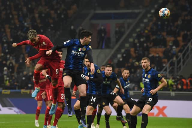 Roberto Firmino heads home for Liverpool against Inter. Picture: John Powell/Liverpool FC via Getty Images