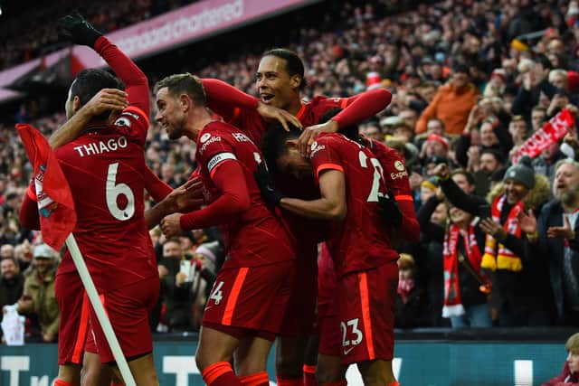 Liverpool celebrate during their 3-1 win over Norwich. Picture: Andrew Powell/Liverpool FC via Getty Images