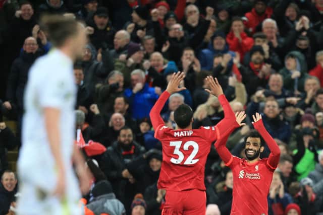 Joel Matip celebrates scoring with Mo Salah. Picture:  LINDSEY PARNABY/AFP via Getty Images