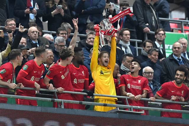 Caoimhin Kelleher lifts the Carabao Cup. Picture: JUSTIN TALLIS/AFP via Getty Images
