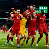 Caoimhin Kelleher, Diogo Jota, Andy Robertson, Ibrahima Konate and Fabinho of Liverpool celebrate the win at the end of the Carabao Cup Final match between Chelsea and Liverpool at Wembley Stadium on February 27, 2022