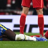 Trevoh Chalobah goes down injured during Chelsea’s Carabao Cup final loss to Liverpool Picture: GLYN KIRK/AFP via Getty Images