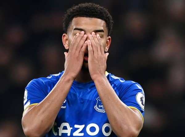 Mason Holgate of Everton looks dejected after Harry Kane of Tottenham Hotspur scores their sides third goal during the Premier League match between Tottenham Hotspur and Everton at Tottenham Hotspur Stadium on March 07, 2022 in London, England. (Photo by Shaun Botterill/Getty Images