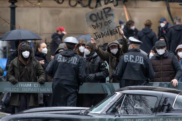 Gotham City citizens demonstrate outside Gotham City Hall - aka St George’s Hall. Image: Colin McPherson/Getty Images