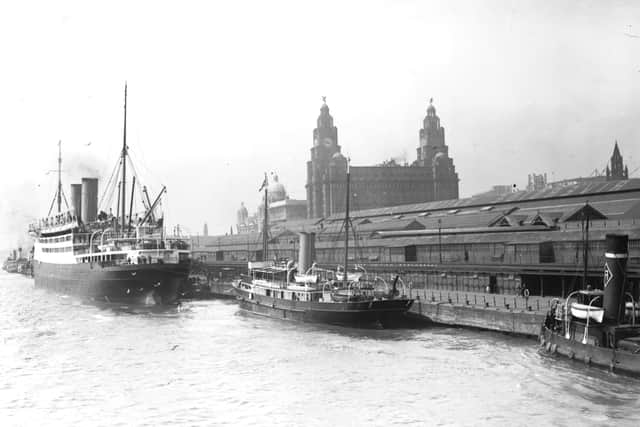 The Royal Liver Building stands proud over the docks in the 1920s. Photo: Fox Photos/Getty Images