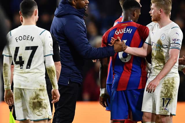 Kevin de Bruyne shakes hands with Crystal Palace boss Patrick Viera. Picture: BEN STANSALL/AFP via Getty Images
